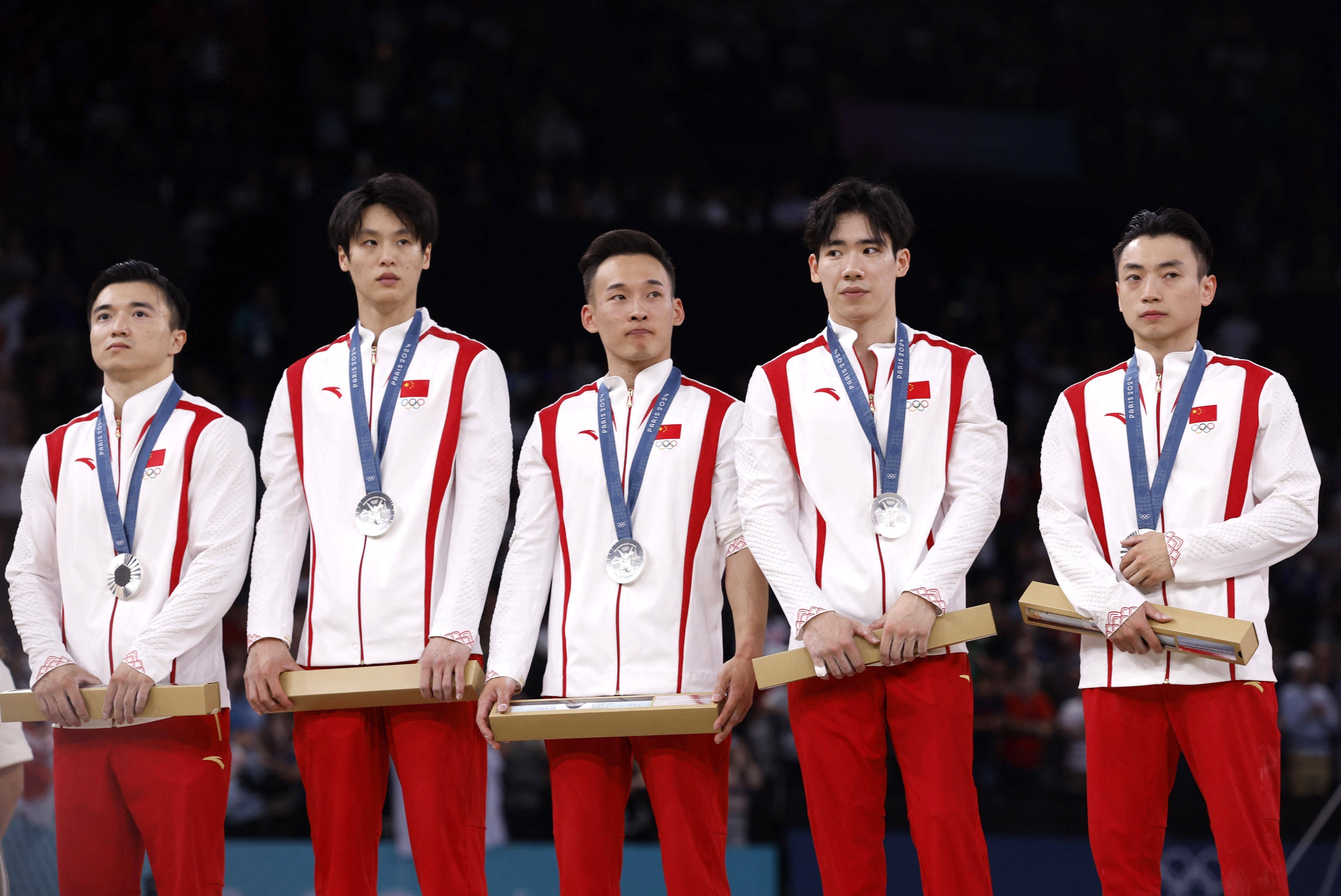 体操团体赛上演绝佳表演，银牌铁定归属